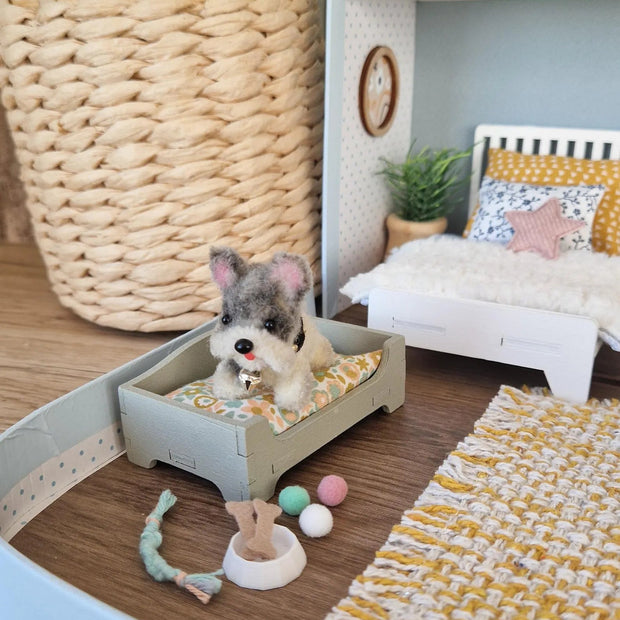 miniature dog, miniature plush puppy. puupy bed