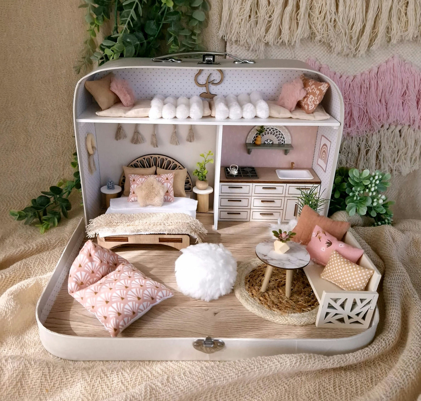 Handmade dollhouse in a suitcase with wooden accessories